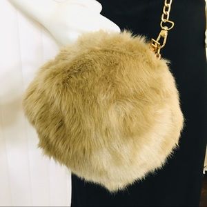 Tan camel colored furry crossbody purse